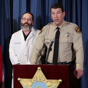 Sheriff Jim Fryhoff speaks at a press conference in uniform.