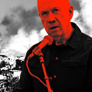 A photo illustration of Israeli Defense Minister Yoav Gallant in front of Gaza.