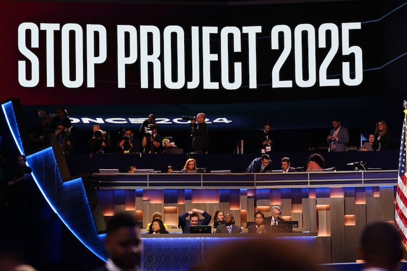 A 'Stop Project 2025' sign is projected during Day 1 of the Democratic National Convention (DNC) at the United Center, in Chicago, Illinois, U.S., August 19, 2024.