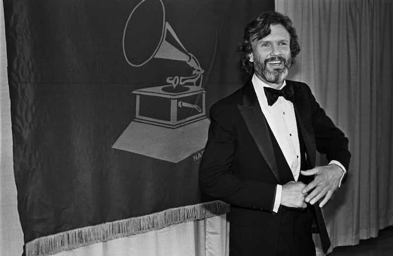 Kris Kristofferson meets the press backstage at the 1980 Grammy Awards in Los Angeles. 