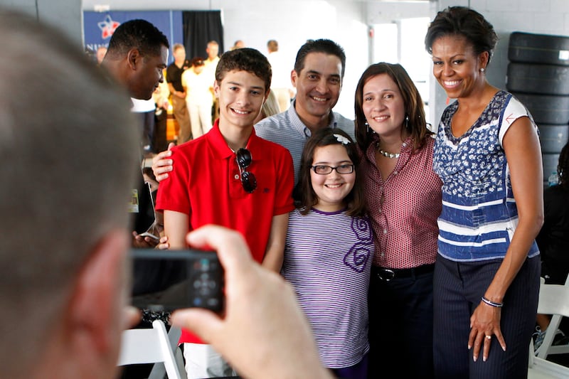 galleries/2012/01/14/michelle-obamas-greatest-moments-photos/michelle-obama-greatest-moments-miliary-famlies_g4ko8z