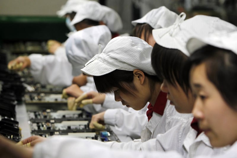 articles/2012/03/31/before-condemning-foxconn-americans-should-examine-their-own-labor-history/china-labor-practices-karabell_scwtrh