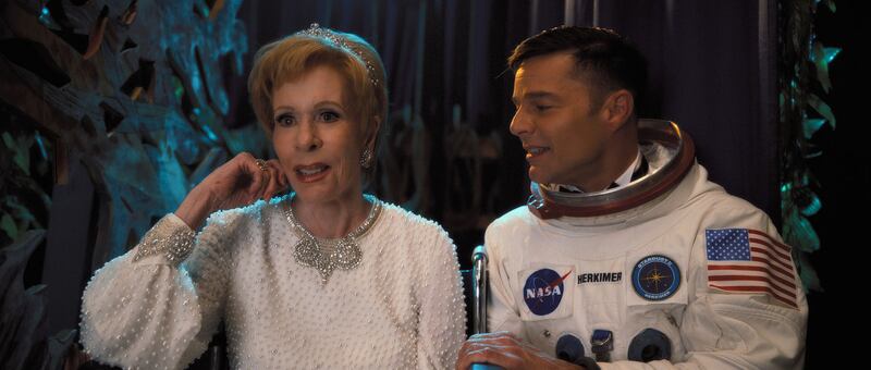 Ricky Martin looks at Carol Burnett in a still from ‘Palm Royale’