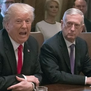 Then-President Donald Trump, center, makes opening remarks as he holds a Cabinet meeting in the White House on January 10, 2018. Defense Secretary James Mattis sits to Trump’s right.