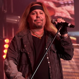 A plane owned by Mötley Crüe frontman Vince Neil, left, was involved in a deadly airport collision Monday.