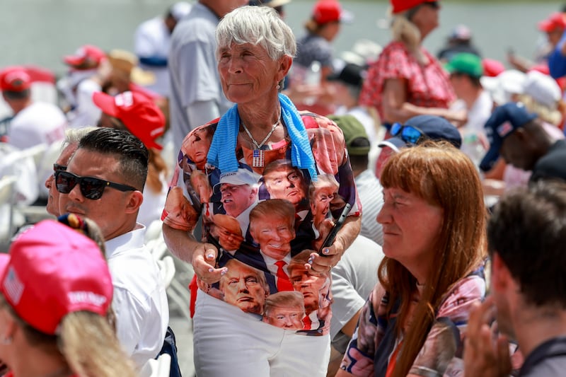 Supporters of former President Donald Trump await his arrival for a campaign rally at the Trump National Doral Golf Club on July 09, 2024 in Doral, Florida. Trump continues to campaign ahead of the Republican National Convention which begins on July 15.