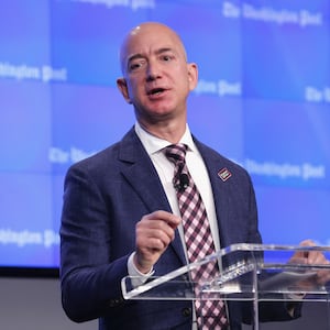 Jeff Bezos speaks from a podium.