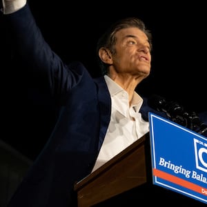 Mehmet Oz speaks at a political rally.