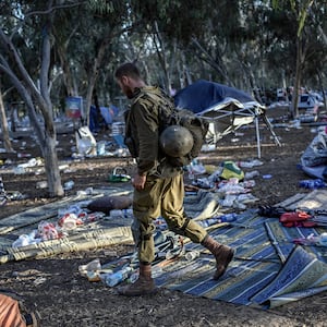 An Israeli soldier patrols near Kibbutz Beeri in southern Israel.