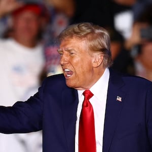 Donald Trump gestures during a rally in Butler.