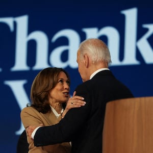 Democratic presidential candidate and U.S. Vice President Kamala Harris and U.S. President Joe Biden embrace on stage during Day one of the Democratic National Convention (DNC) in Chicago, Illinois, U.S., August 19, 2024. 