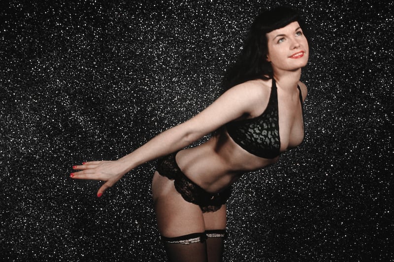 articles/2013/11/23/bettie-page-reveals-all-a-close-up-look-at-the-pinup-goddess-and-sexual-icon/131122-stern-page-tease_exytqz