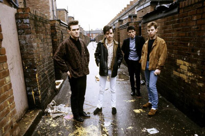 articles/2013/10/13/bigmouth-strikes-again-smiths-bassist-andy-rourke-tells-all/131012-moynihan-smiths-tease_fjgb8o