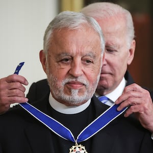 President Joe Biden presents the Presidential Medal of Freedom to Father Alexander Karloutsos.