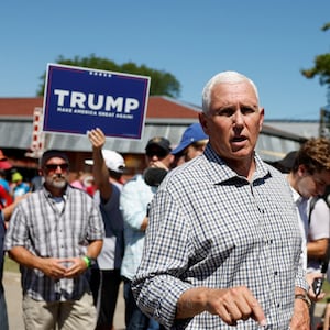 Mike Pence, one of the participants in the first GOP primary debate, campaigns for the 2024 Republican presidential nomination at the Iowa State Fair in Des Moines, Iowa, Aug. 11, 2023. 