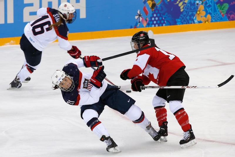 galleries/2014/02/13/gloves-come-off-and-women-s-hockey-gets-dirty-in-sochi-photos/140212-oly-hockey8_kptwjz