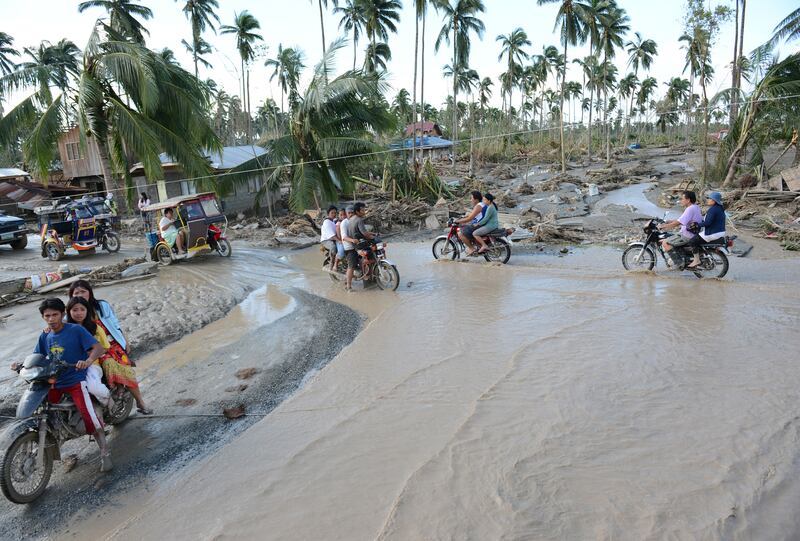 galleries/2012/12/05/typhoon-bopha-slams-philippines-photos/05typhoon8-2560_pfdysn