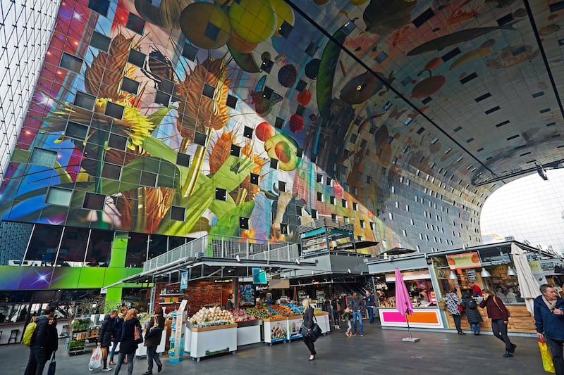 Sun shining through the 'Markthal' market Hall in Rotterdam, Netherlands.