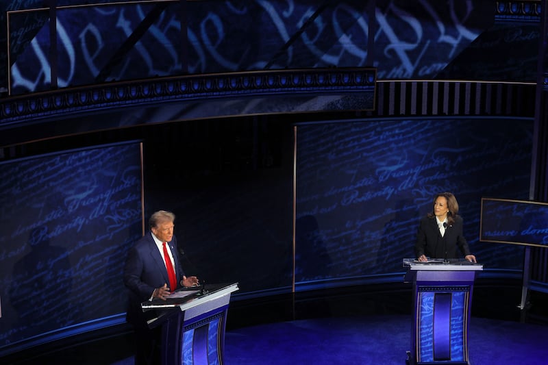 Donald Trump, left, and Kamala Harris attend a presidential debate hosted by ABC in Philadelphia, Pennsylvania, U.S.,  September 10, 2024.