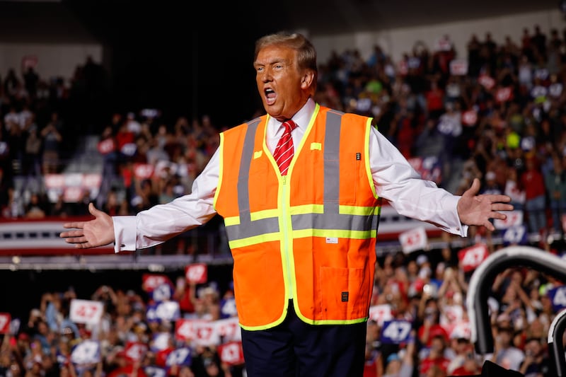 Trump wore a visibility vest to troll Biden.