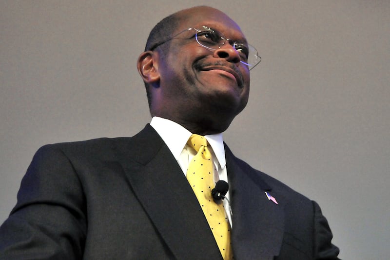 articles/2011/11/04/herman-cain-fashion-double-breasted-suits-don-t-fit-his-message/herman-cain-suit-givhan_yrc0yh