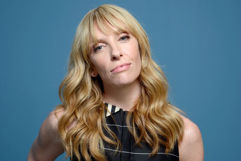 articles/2014/06/01/toni-collette-on-the-realistic-joneses-lucky-them-and-crying-in-the-sixth-sense/140530-leon-toni-tease_y7jmps