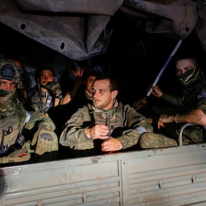 Fighters from Wagner Group in Rostov-on-Don in a vehicle.