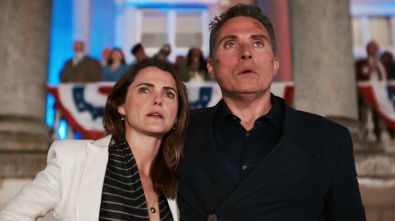 Keri Russell as Kate Wyler, Rufus Sewell as Hal Wyler in The Diplomat.