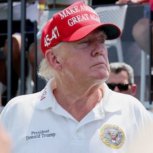 Former President Donald Trump looks on before the first round of the LIV Golf Bedminster golf tournament at Trump National Bedminster. 