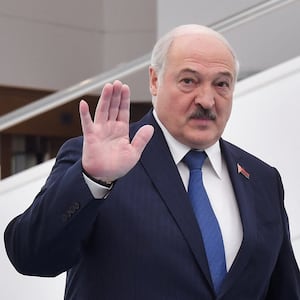 Belarusian President Alexander Lukashenko waves