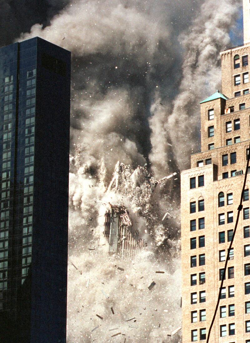 A photo Petra Beter took of one of the towers of the World Trade Center collapses after being struck by a hijacked commercial airplane on Sept. 11, 2001.