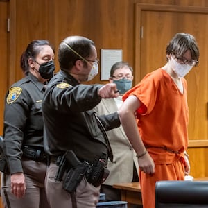 Ethan Crumbley is led away from the courtroom after a placement hearing at Oakland County Circuit Court on February 22, 2022 in Pontiac, Michigan.