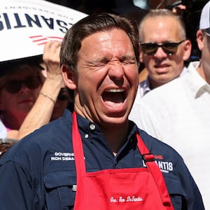 A picture of Republican U.S. presidential candidate and Florida Governor Ron DeSantis. DeSantis is getting endlessly trolled at the Iowa State Fair by hecklers, protestors, and even a plane flying overhead with a banner that read “Be likable, Ron!”