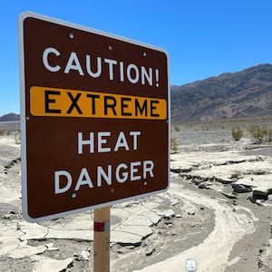 A view of sign board warning of extreme heat in Death Valley, California, U.S. July 15, 2023. 