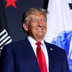 Donald Trump smiles during a campaign rally in Windham, New Hampshire, Aug. 8, 2023.