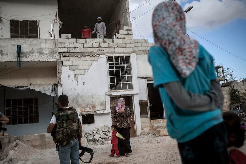 galleries/2013/10/09/the-last-ones-left-photos-of-a-syrian-family-that-refuse-to-leave-their-village/131007-syria-family8_vdonuf