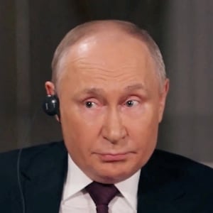 Russian President Vladimir Putin speaks during an interview with U.S. television host Tucker Carlson in Moscow.