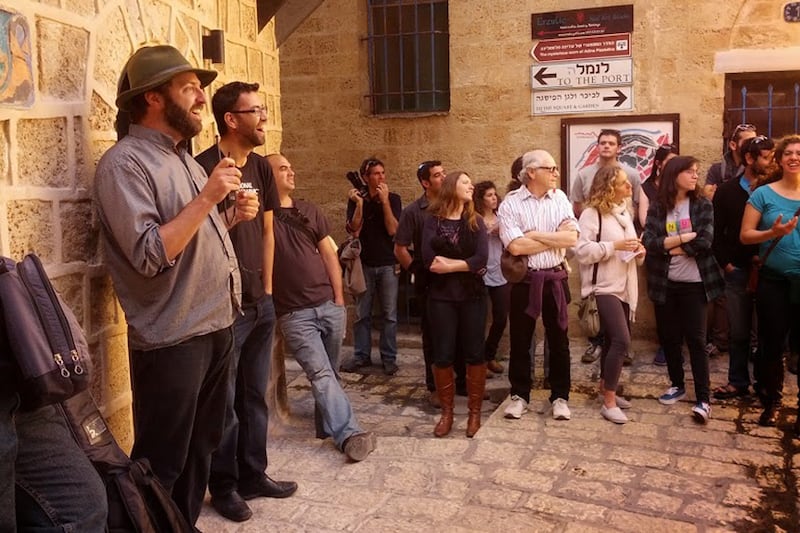 articles/2014/02/16/israeli-tour-companies-give-a-tale-of-two-holy-lands/140216-jaffa_tour-feldinger-embed_bexrq5