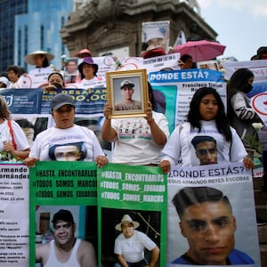 Relatives of missing people take part in a protest for victims in Mexico City.