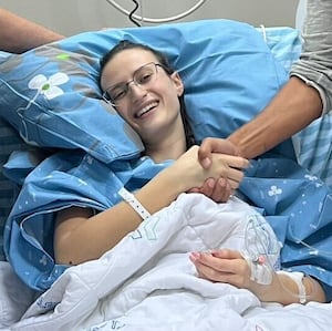 A photo of 23-year-old terror survivor Tamar Kam in a hospital bed in Be'er Sheva, Israel.