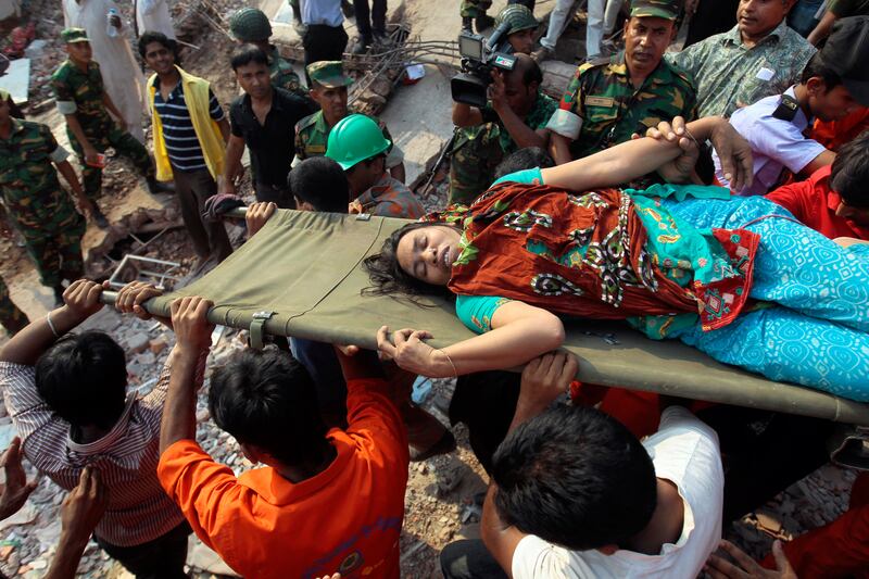 galleries/2013/04/24/tragic-aftermath-of-building-collapse-in-bangladesh/130424-bangladesh2_n4kk0b