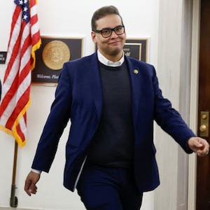 Rep. George Santos (R-NY) returns to his office after telling a Republican party conference that he will recuse himself from House committee assignments on Capitol Hill in Washington, DC. 