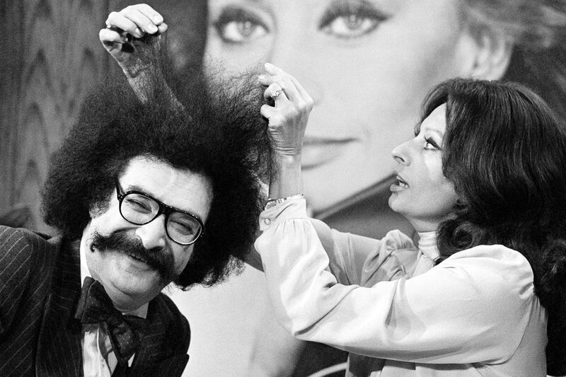 galleries/2012/04/23/cher-barbara-streisand-and-more-celebrities-with-groovy-white-afros-photos/white-afros-gene-shalit_r3n7la