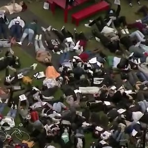 Students take part in a “die-in” at Harvard in a pro-Palestinian protest. 