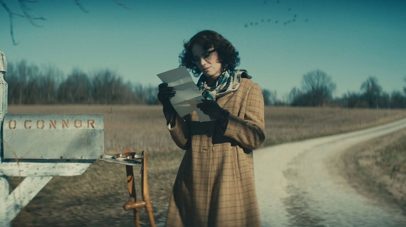 Maya Hawke reads a letter in a still from ‘Wildcat’