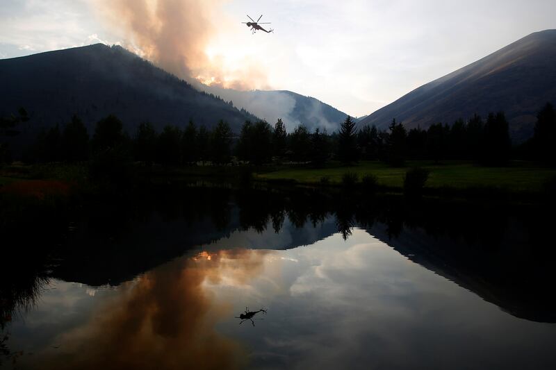 galleries/2013/08/18/wildfires-rage-in-idaho-photos/130818-idaho-fire-03_paybbi