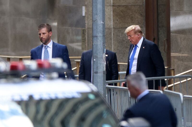 Donald and Eric Trump leave the courthouse after the conviction		