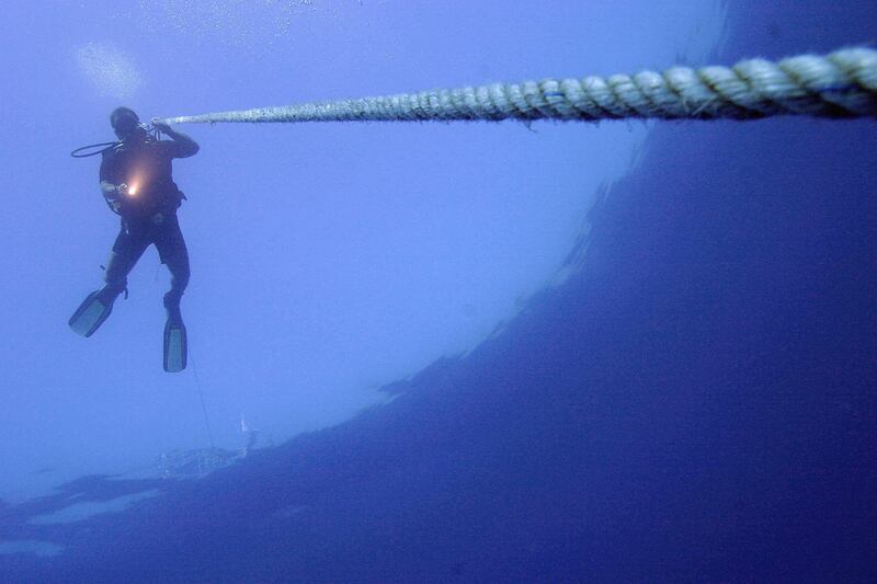 articles/2013/03/30/what-were-egypt-s-divers-up-to-with-underwater-cables/130329-dickey-underwater-tease_rhxb4k