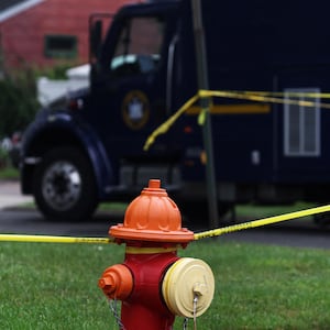 Crime scene tape hangs near the residence of architect Rex Heuermann, who was arrested in connection with serial killings more than a decade ago in Gilgo beach, in Massapequa Park, New York, July 19, 2023. 