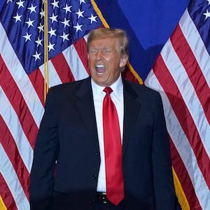 Republican presidential candidate former US President Donald Trump arrives for a campaign event at the Atkinson Resort and Country Club in Atkinson, New Hampshire.